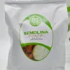 a white bag with green label
